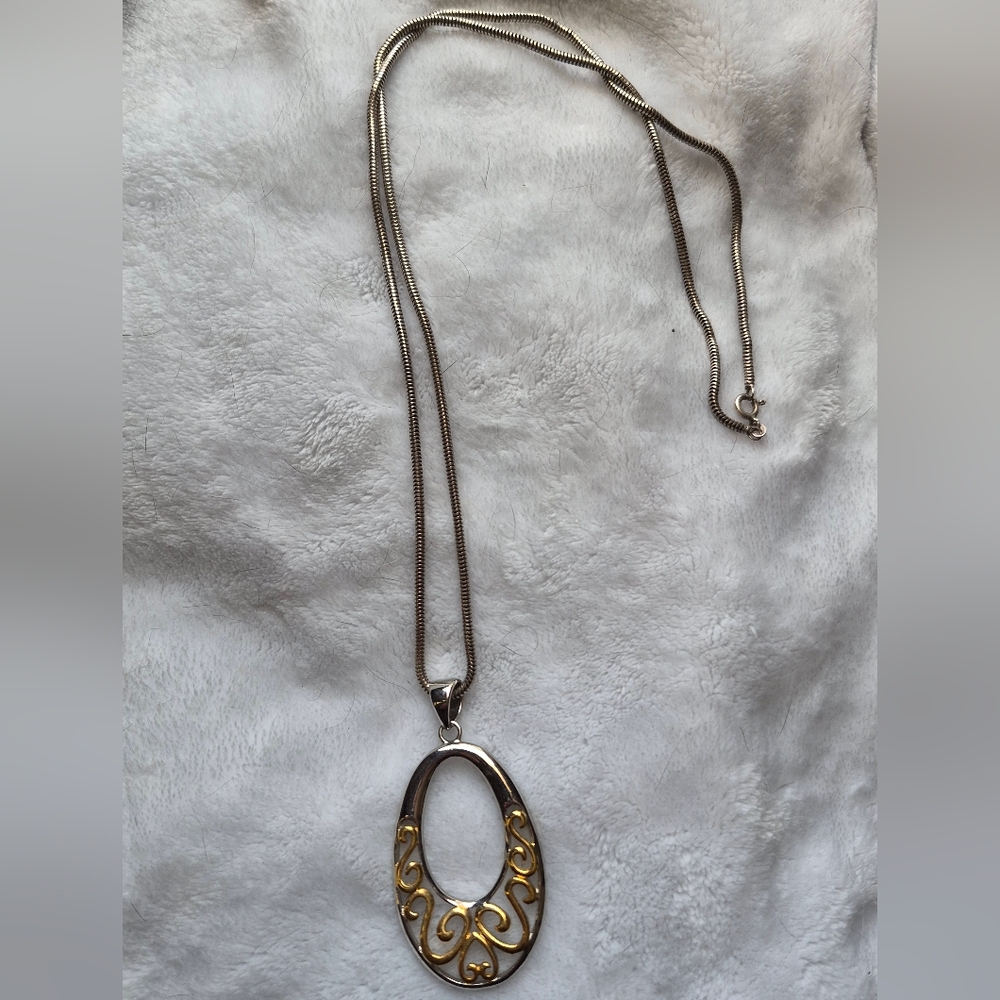 Lia Sophia Elegant Gold and Silver Pendant Necklace